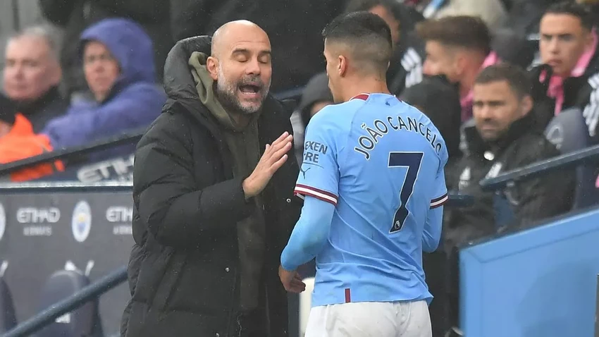 pep guardiola cancelo manchester city 8569.jpg